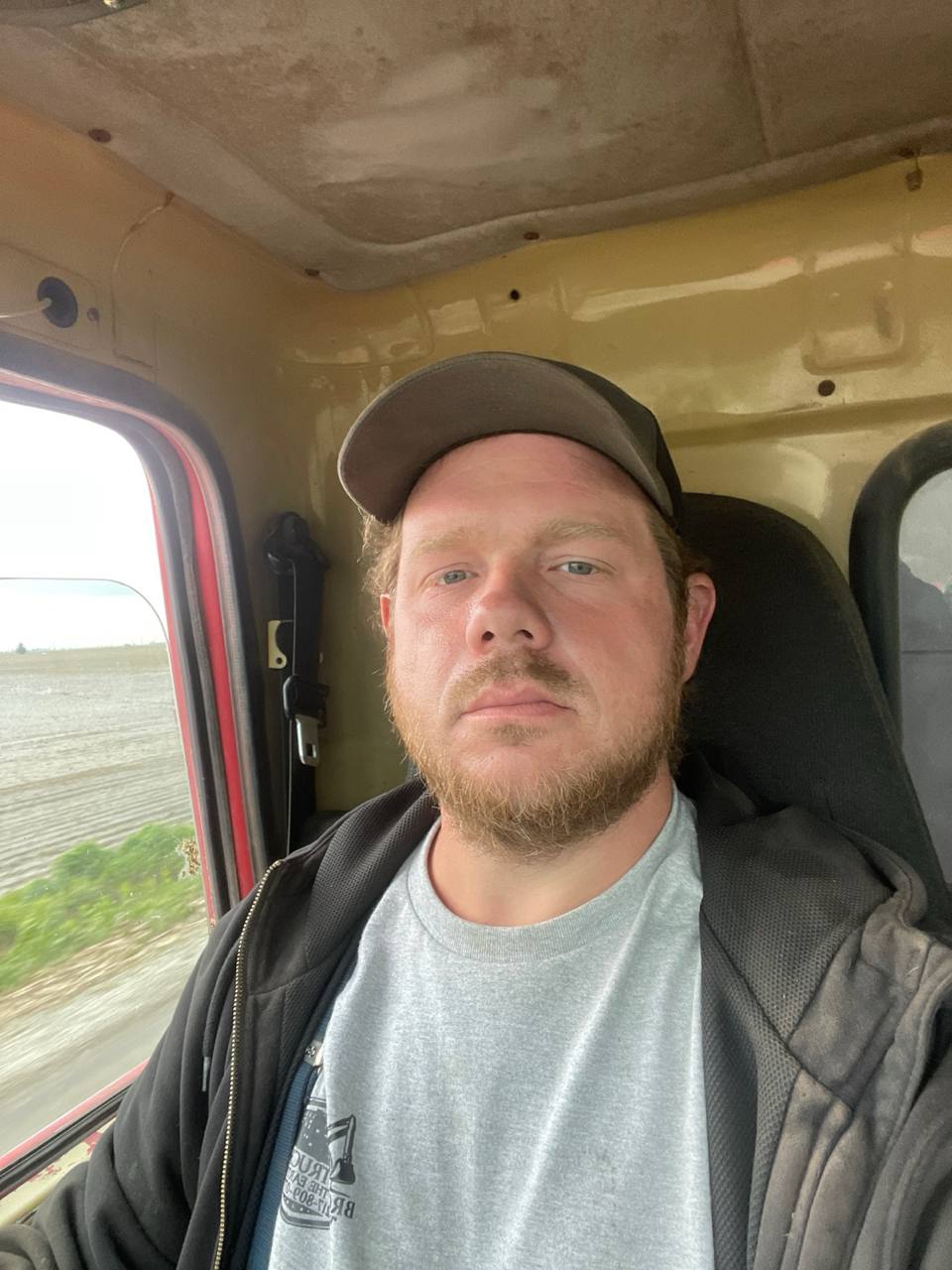 Levi Brohez — owner-operator of Brohez Trucking LLC, Mattoon IL excavation contractor, in the cab